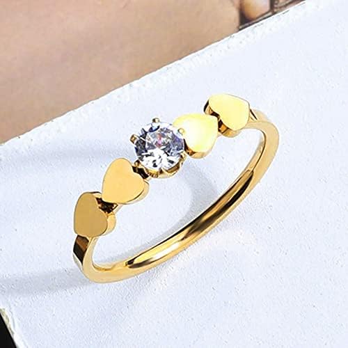 Womenените ветуваат прстен на личноста мода loveубов симетричен циркон венчален прстен предлог за не'рѓосувачки